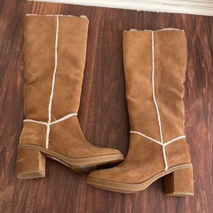 UGG winter boots, never worn, size 10, comes about 2 inches under the knee